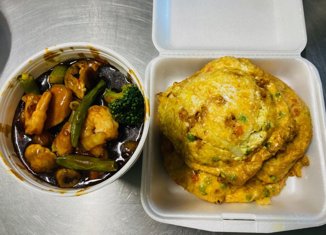 Shrimp and vegetable stir-fry with egg foo young to go